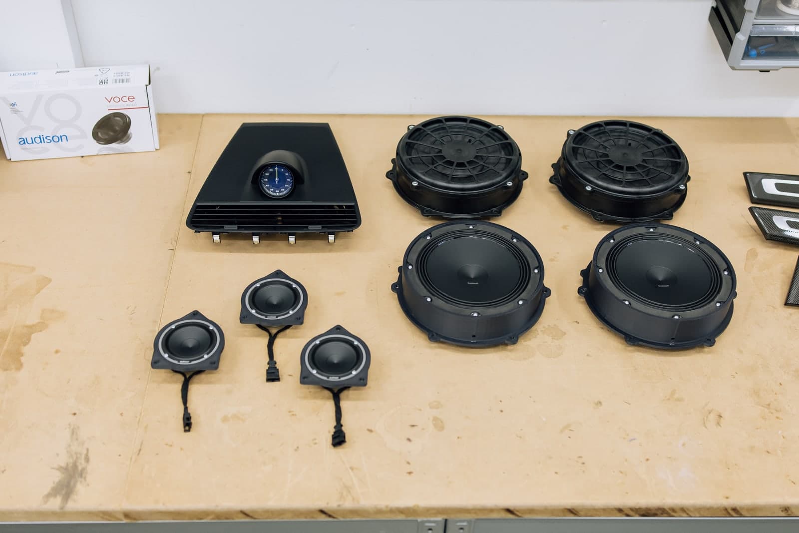 In-house 3D-CAD mounting rings and high-end Audison speakers on the workbench at AutoSound24